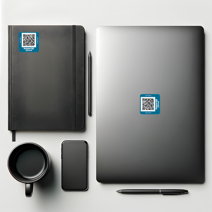 A photo of a laptop and notebook with KeeperQR sticker